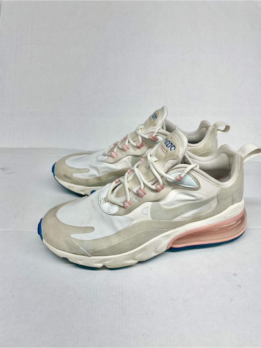 Nike Women's White and Pink Air-Cushioned Sneakers
